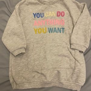 Sweatshirt dress for a toddler girl. Main color gray but a few other colors